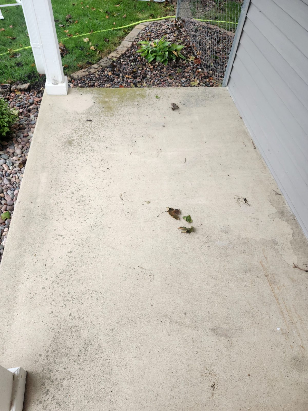 Before: Sideway of house, glossy clean finish